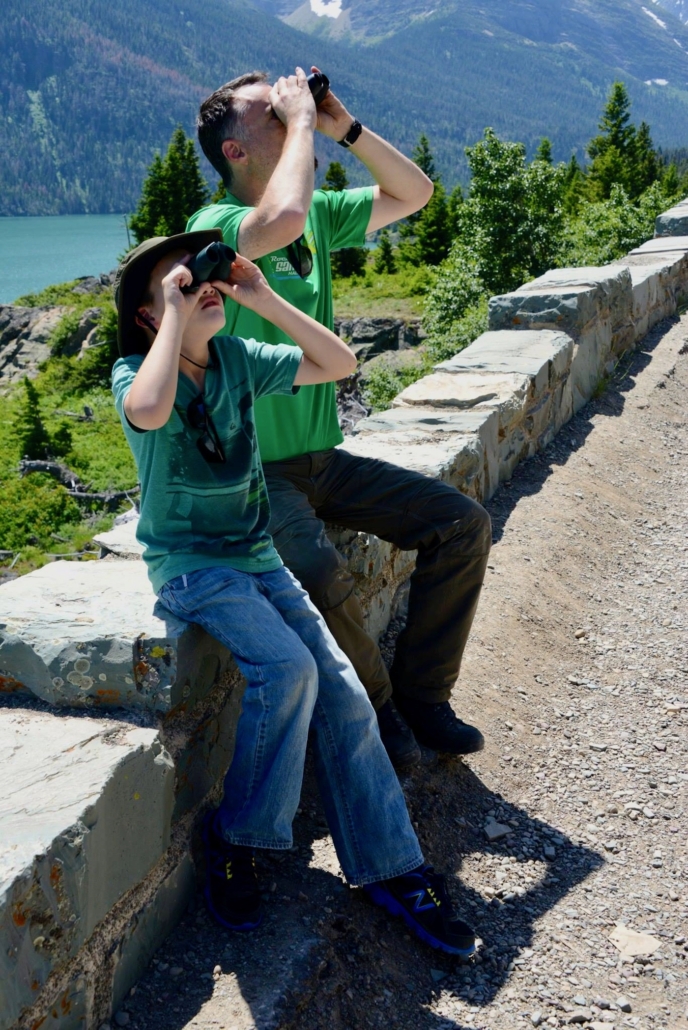 Father and son doing Citizen Science; birdwatching