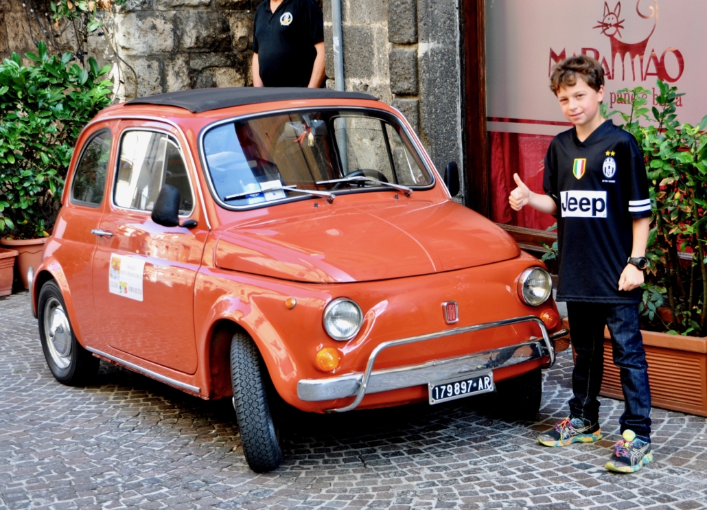 Italy with kids orange car