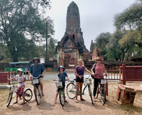 family on bikes in Ayuthaya, Thailand