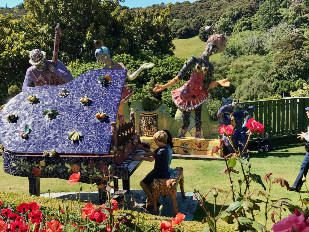Kids playing a mosaic piano, music and worldschooling, The Giants House